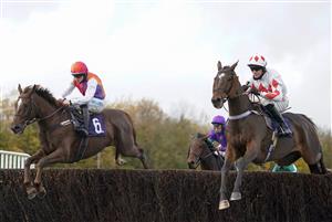 CHEPSTOW, WALES - OCTOBER 27: James Bowen riding Wayfinder (L) on their way to winning The Ed Culham Tips At tipstersempire.co.uk Novices' Handicap Chase (GBB Race) at Chepstow Racecourse on October 27, 2020 in Chepstow, Wales. Owners are allowed to attend if they have a runner at the meeting otherwise racing remains behind closed doors to the public due to the Coronavirus pandemic. (Photo by Alan Crowhurst/Getty Images)