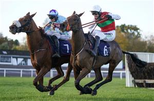 CHEPSTOW, WALES - OCTOBER 27: Adrian Heskin riding The Wolf (L, blue) clear the last to win The CD Racing At tipstersempire.co.uk Beginners' Chase at Chepstow Racecourse on October 27, 2020 in Chepstow, Wales. Owners are allowed to attend if they have a runner at the meeting otherwise racing remains behind closed doors to the public due to the Coronavirus pandemic. (Photo by Alan Crowhurst/Getty Images)