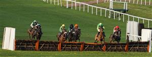 CHEPSTOW, WALES - OCTOBER 27: Nick Scholfield riding Lamanver Bel Ami (2R, green) clear the last to win The MJ Racing At tipstersempire.co.uk Handicap Hurdle at Chepstow Racecourse on October 27, 2020 in Chepstow, Wales. Owners are allowed to attend if they have a runner at the meeting otherwise racing remains behind closed doors to the public due to the Coronavirus pandemic. (Photo by Alan Crowhurst/Getty Images)