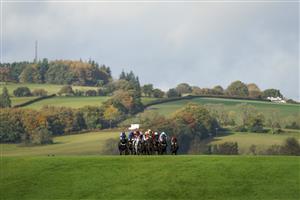 CHEPSTOW, WALES - OCTOBER 27: A general view as runners drop down the hill towards bend and the back straight at Chepstow Racecourse on October 27, 2020 in Chepstow, Wales. Owners are allowed to attend if they have a runner at the meeting otherwise racing remains behind closed doors to the public due to the Coronavirus pandemic. (Photo by Alan Crowhurst/Getty Images)