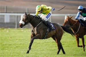 CHEPSTOW, WALES - OCTOBER 27: Tom Scudamore riding Molliana (yellow) clear the last to win The Cotswold Racing At tipstersempire.co.uk Mares' Handicap Hurdle at Chepstow Racecourse on October 27, 2020 in Chepstow, Wales. Owners are allowed to attend if they have a runner at the meeting otherwise racing remains behind closed doors to the public due to the Coronavirus pandemic. (Photo by Alan Crowhurst/Getty Images)