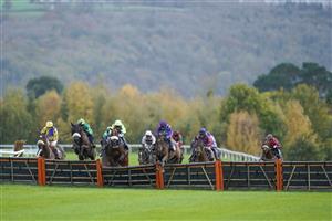 TAUNTON, ENGLAND - OCTOBER 28: Rex Dingle riding Marilyn Monroe (C, purple) clear the last to win The Porter Dodson Handicap Hurdleat Taunton Racecourse on October 28, 2020 in Taunton, England. Owners are allowed to attend if they have a runner at the meeting otherwise racing remains behind closed doors to the public due to the Coronavirus pandemic. (Photo by Alan Crowhurst/Getty Images)