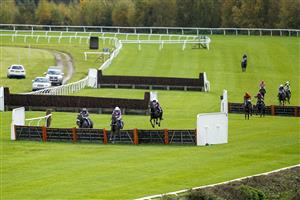 TAUNTON, ENGLAND - OCTOBER 28: Tom Cannon riding Isolate (R) clear the last to win The Summerfield Developments Novices' Hurdle at Taunton Racecourse on October 28, 2020 in Taunton, England. Owners are allowed to attend if they have a runner at the meeting otherwise racing remains behind closed doors to the public due to the Coronavirus pandemic. (Photo by Alan Crowhurst/Getty Images)