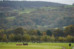 TAUNTON, ENGLAND - OCTOBER 28: Tom Cannon riding Isolate (R) turn into the straight to win The Summerfield Developments Novices' Hurdle at Taunton Racecourse on October 28, 2020 in Taunton, England. Owners are allowed to attend if they have a runner at the meeting otherwise racing remains behind closed doors to the public due to the Coronavirus pandemic. (Photo by Alan Crowhurst/Getty Images)