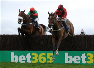 WETHERBY, ENGLAND - OCTOBER 30: Huntsman Son (right) ridden by Kielan Woods clears the last before going on to win the Cash Out At bet365 Handicap Chase at Wetherby Racecourse on October 30, 2020 in Wetherby, England. (Photo by Tim Goode - Pool/Getty Images)
