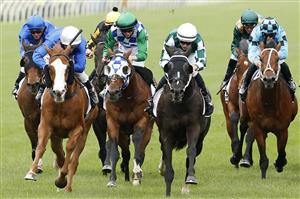MELBOURNE, AUSTRALIA - OCTOBER 31: Damian Lane rides Yulong Prince to win race 8 the Kennedy Cantala during 2020 AAMI Victoria Derby Day at Flemington Racecourse on October 31, 2020 in Melbourne, Australia. (Photo by Darrian Traynor/Getty Images for the VRC)