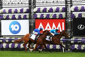 MELBOURNE, AUSTRALIA - OCTOBER 31: Daniel Stackhouse riding #1 Crosshaven wins race one the Network 10 Carbine Club Stakes ahead of Damian Lane riding #3 Aysar during 2020 AAMI Victoria Derby Day at Flemington Racecourse on October 31, 2020 in Melbourne, Australia. (Photo by Robert Cianflone/Getty Images for the VRC)