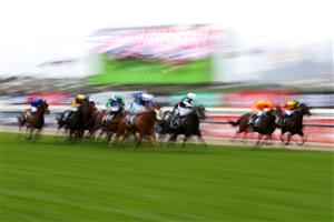 MELBOURNE, AUSTRALIA - OCTOBER 31: General view as the field runs down the straight as Damian Lane riding #5 Yulong Prince goes on to win race eight the Kennedy Cantala from Damien Oliver riding #7 Cascadian and Michael Poy riding #9 Rock during 2020 AAMI Victoria Derby Day at Flemington Racecourse on October 31, 2020 in Melbourne, Australia. (Photo by Robert Cianflone/Getty Images for the VRC)
