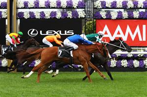 MELBOURNE, AUSTRALIA - OCTOBER 31: Damian Lane riding #5 Yulong Prince wins race eight the Kennedy Cantala from Damien Oliver riding #7 Cascadian and Michael Poy riding #9 Rock during 2020 AAMI Victoria Derby Day at Flemington Racecourse on October 31, 2020 in Melbourne, Australia. (Photo by Robert Cianflone/Getty Images for the VRC)