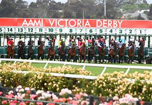 MELBOURNE, AUSTRALIA - OCTOBER 31: Jockey Lachlan King riding Johnny Get Angry out of barrier #5 before winning in Race 7, the Aami Victoria Derby, during 2020 AAMI Victoria Derby Day at Flemington Racecourse on October 31, 2020 in Melbourne, Australia. (Photo by Vince Caligiuri/Getty Images for the VRC)