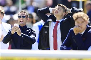 SYDNEY, AUSTRALIA - NOVEMBER 03: Punters react as they watch the Melbourne Cup on the big screen at Royal Randwick Racecourse on November 03, 2020 in Sydney, Australia. (Photo by Mark Evans/Getty Images)