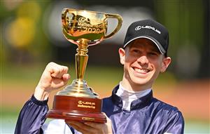 MELBOURNE, AUSTRALIA - NOVEMBER 03: Jye McNeil who rode Twilight Payment celebrates with the trophy after winning the Lexus melbourne Cup during 2020 Lexus Melbourne Cup Day at Flemington Racecourse on November 03, 2020 in Melbourne, Australia. (Photo by Quinn Rooney/Getty Images for the VRC)