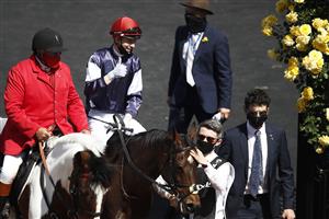 MELBOURNE, AUSTRALIA - NOVEMBER 03: Jockey Jye McNeil celebrates after riding Twilight Payment to win Race 7, the Lexus Melbourne Cup, during 2020 Lexus Melbourne Cup Day at Flemington Racecourse on November 03, 2020 in Melbourne, Australia. (Photo by Daniel Pockett/Getty Images for the VRC)