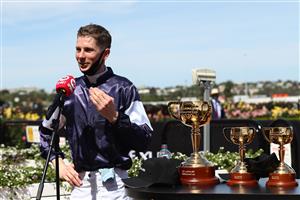 MELBOURNE, AUSTRALIA - NOVEMBER 03: Jye McNeil riding #6 Twilight Payment talks to the media after winning race 7, the Lexus Melbourne Cup during 2020 Lexus Melbourne Cup Day at Flemington Racecourse on November 03, 2020 in Melbourne, Australia. (Photo by Robert Cianflone/Getty Images for the VRC)