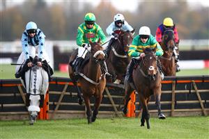 NEWBURY, ENGLAND - NOVEMBER 05: Lorcan Williams riding Tomorrow Mystery goes over the final jump on their way to winning the tote.co.uk Ten To Follow Conditional Jockeys' Handicap Hurdle at Newbury Racecourse on November 05, 2020 in Newbury, England. (Photo by Michael Steele/Getty Images)