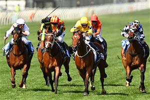 MELBOURNE, AUSTRALIA - NOVEMBER 05: Hugh Bowman on board Rocha Clock wins race 6 Inglis Bracelet during 2020 Kennedy Oaks Day at Flemington Racecourse on November 05, 2020 in Melbourne, Australia. (Photo by Quinn Rooney/Getty Images for the VRC)