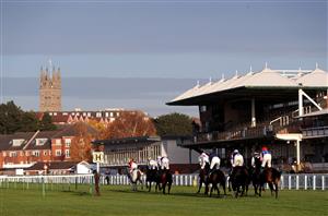WARWICK, ENGLAND - NOVEMBER 06: Runners and riders pass the grand stand as they compete in the British EBF Mares' Standard Open NH Flat Race at Warwick Racecourse on November 6, 2020 in Warwick, England. (Photo by David Davies - Pool / Getty Images)