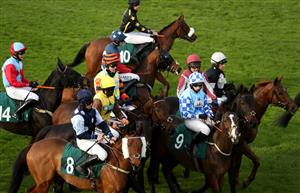 WARWICK, ENGLAND - NOVEMBER 06: Runners and riders gather ahead of the start of the Bet At racingtv.com Handicap Hurdle at Warwick Racecourse on November 6, 2020 in Warwick, England. (Photo by David Davies - Pool / Getty Images)
