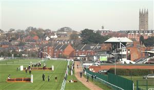 WARWICK, ENGLAND - NOVEMBER 06: A general view of runners and riders in the Bet At racingtv.com Handicap Hurdle at Warwick Racecourse on November 6, 2020 in Warwick, England. (Photo by David Davies - Pool / Getty Images)