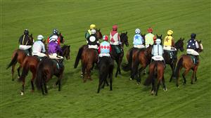 WARWICK, ENGLAND - NOVEMBER 06: Runners and riders gather ahead of the start of the Bet At racingtv.com Handicap Hurdle at Warwick Racecourse on November 6, 2020 in Warwick, England. (Photo by David Davies - Pool / Getty Images)