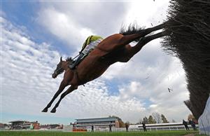 WARWICK, ENGLAND - NOVEMBER 06: Allmankind ridden by Harry Skelton jumps a fence before winning the Stan Mellor Memorial Novices Chase at Warwick Racecourse on November 6, 2020 in Warwick, England. (Photo by David Davies - Pool / Getty Images)