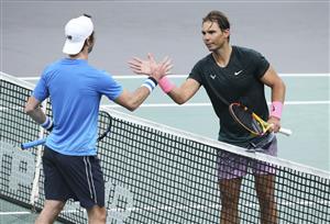 PARIS, FRANCE - NOVEMBER 5: Winner Rafael Nadal of Spain greets Jordan Thompson of Australia at the net following his victory during day 4 of the Rolex Paris Masters, an ATP Masters 1000 tournament held behind closed doors at AccorHotels Arena formerly known as Paris Bercy on November 5, 2020 in Paris, France. (Photo by Jean Catuffe/Getty Images)