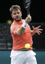 PARIS, FRANCE - NOVEMBER 5: Stan Wawrinka of Switzerland in action against Andrey Rublev of Russia during day 4 of the Rolex Paris Masters, an ATP Masters 1000 tournament held behind closed doors at AccorHotels Arena formerly known as Paris Bercy on November 5, 2020 in Paris, France. (Photo by Jean Catuffe/Getty Images)