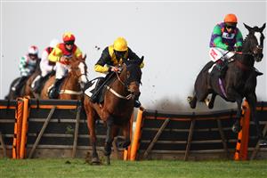 WINCANTON, ENGLAND - NOVEMBER 07: Bryony Frost on board Perfect Myth (L) jumps with eventual winner Richard Johnson on The White Mouse during the Richard Barber Memorial Mares' Handicap Hurdle at Wincanton Racecourse on November 7, 2020 in Wincanton, England. (Photo by Michael Steele/Getty Images)