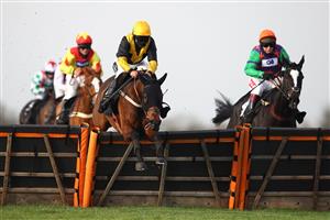 WINCANTON, ENGLAND - NOVEMBER 07: Bryony Frost on board Perfect Myth (L) jumps with eventual winner Richard Johnson on The White Mouse during the Richard Barber Memorial Mares' Handicap Hurdle at Wincanton Racecourse on November 7, 2020 in Wincanton, England. (Photo by Michael Steele/Getty Images)