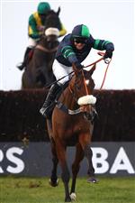 WINCANTON, ENGLAND - NOVEMBER 07: David Bass on board El Presente jump on their way to victory during the Badger Beers Silver Trophy Handicap Chase at Wincanton Racecourse on November 7, 2020 in Wincanton, England. (Photo by Michael Steele/Getty Images)