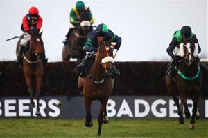 WINCANTON, ENGLAND - NOVEMBER 07: David Bass on board El Presente jump on their way to victory during the Badger Beers Silver Trophy Handicap Chase at Wincanton Racecourse on November 7, 2020 in Wincanton, England. (Photo by Michael Steele/Getty Images)