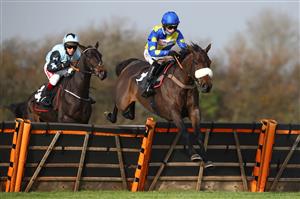 WINCANTON, ENGLAND - NOVEMBER 07: Harry Cobden on board Flic Ou Voyou on their way to victory during the EBF Stallions 'National Hunt' Novices' Hurdle at Wincanton Racecourse on November 7, 2020 in Wincanton, England. (Photo by Michael Steele/Getty Images)