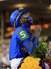 LEXINGTON, KENTUCKY - NOVEMBER 06: Luis Saez celebrates after riding Essential Quality to victory in the Breeder's Cup Juvenile during the 2020 Breeder's Cup at Keeneland on November 06, 2020 in Lexington, Kentucky. (Photo by Andy Lyons/Getty Images)