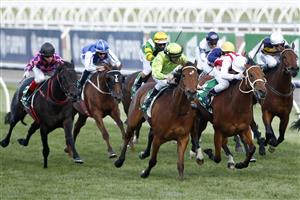 MELBOURNE, AUSTRALIA - NOVEMBER 07: Michael Poy rides Affair To Remember to win race 7 the Matriarch Stakes during 2020 Seppelt Wines Stakes Day at Flemington Racecourse on November 07, 2020 in Melbourne, Australia. (Photo by Darrian Traynor/Getty Images for the VRC)