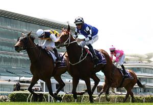 MELBOURNE, AUSTRALIA - NOVEMBER 07: Declan Bates riding #2 Barade wins just ahead of Hugh Bowman riding #1 Almania during race 1, the Special Kids Pin & Win Trophy during 2020 Seppelt Wines Stakes Day at Flemington Racecourse on November 07, 2020 in Melbourne, Australia. (Photo by Robert Cianflone/Getty Images for the VRC)