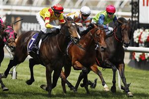 MELBOURNE, AUSTRALIA - NOVEMBER 07: Jye McNeil riding #7 Power Scheme (L) wins race 4, the Nova100 Trophy during 2020 Seppelt Wines Stakes Day at Flemington Racecourse on November 07, 2020 in Melbourne, Australia. (Photo by Daniel Pockett/Getty Images for the VRC)