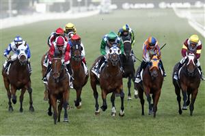 MELBOURNE, AUSTRALIA - NOVEMBER 07: Luke Currie rides Arcadia Queen to win race 8 the Seppelt Mackinnon Stakes during 2020 Seppelt Wines Stakes Day at Flemington Racecourse on November 07, 2020 in Melbourne, Australia. (Photo by Darrian Traynor/Getty Images for the VRC)