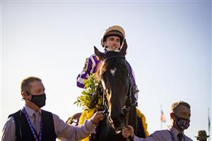 LEXINGTON, KY - NOVEMBER 07: Christophe Soumillon, riding Order of Australia, celebrates after winning the Breeders Cup Mile at Keenland on November 6, 2020 in Lexington, Kentucky. (Photo by Bobby Ellis/Getty Images)