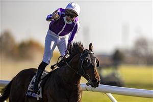 LEXINGTON, KY - NOVEMBER 07: Christophe Soumillon, riding Order of Australia, celebrates after winning the Breeders Cup Mile at Keenland on November 6, 2020 in Lexington, Kentucky. (Photo by Bobby Ellis/Getty Images)