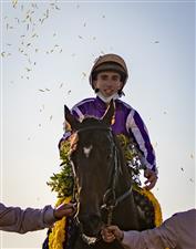 LEXINGTON, KY - NOVEMBER 07: Christophe Soumillon, riding Order of Australia, celebrates after winning the Breeders Cup Mile at Keenland on November 6, 2020 in Lexington, Kentucky. (Photo by Bobby Ellis/Getty Images)