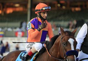 LEXINGTON, KENTUCKY - NOVEMBER 07: John Velazquez celebrates after riding Authentic to victory in the Breeders' Cup Classic during 2020 Breeders' Cup at Keeneland on November 07, 2020 in Lexington, Kentucky. (Photo by Andy Lyons/Getty Images)