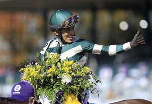 LEXINGTON, KENTUCKY - NOVEMBER 07: John Velazquez celebrates after riding Gamine to victory in the Filly and Mare Sprint during 2020 Breeders' Cup at Keeneland on November 07, 2020 in Lexington, Kentucky. (Photo by Andy Lyons/Getty Images)