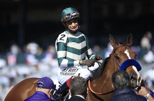 LEXINGTON, KENTUCKY - NOVEMBER 07: John Velazquez celebrates after riding Gamine to victory in the Filly and Mare Sprint during 2020 Breeders' Cup at Keeneland on November 07, 2020 in Lexington, Kentucky. (Photo by Andy Lyons/Getty Images)