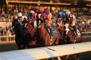 LEXINGTON, KENTUCKY - NOVEMBER 07: Authentic with John Velazquez aboard leads the pack past the finish line on the first lap on the way to victory in the Breeders' Cup Classic during 2020 Breeders' Cup at Keeneland on November 07, 2020 in Lexington, Kentucky. (Photo by Andy Lyons/Getty Images)