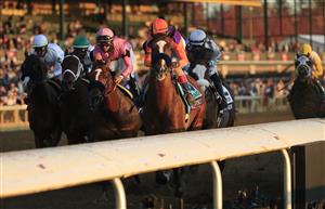 LEXINGTON, KENTUCKY - NOVEMBER 07: Authentic with John Velazquez aboard leads the pack past the finish line on the first lap on the way to victory in the Breeders' Cup Classic during 2020 Breeders' Cup at Keeneland on November 07, 2020 in Lexington, Kentucky. (Photo by Andy Lyons/Getty Images)
