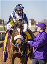 LEXINGTON, KY - NOVEMBER 07: Tom Eaves, riding Glass Slippers, celebrates after winning the Turf Sprint on the second day of the Breeders Cup Championships at Keenland on November 6, 2020 in Lexington, Kentucky. (Photo by Bobby Ellis/Getty Images)