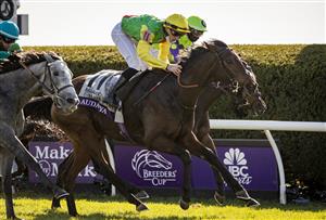 LEXINGTON, KY - NOVEMBER 07: Pierre-Charles Boudot, riding Audarya, crosses the finish line to win the Breeders Cup Filly and Mare Turf at Keenland on November 6, 2020 in Lexington, Kentucky. (Photo by Bobby Ellis/Getty Images)