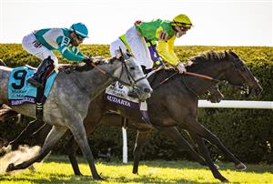 LEXINGTON, KY - NOVEMBER 07: Pierre-Charles Boudot, riding Audarya, crosses the finish line to win the Breeders Cup Filly and Mare Turf at Keenland on November 6, 2020 in Lexington, Kentucky. (Photo by Bobby Ellis/Getty Images)