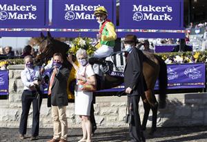 LEXINGTON, KY - NOVEMBER 07: Pierre-Charles Boudot celebrates after winning the Breeders Cup Filly and Mare Turf race on Audarya at Keenland on November 6, 2020 in Lexington, Kentucky. (Photo by Bobby Ellis/Getty Images)