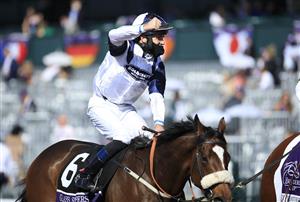 LEXINGTON, KENTUCKY - NOVEMBER 07: Tom Eaves celebrates after riding Glass Slippers to victory in the Turf Sprint during 2020 Breeders' Cup at Keeneland on November 07, 2020 in Lexington, Kentucky. (Photo by Andy Lyons/Getty Images)